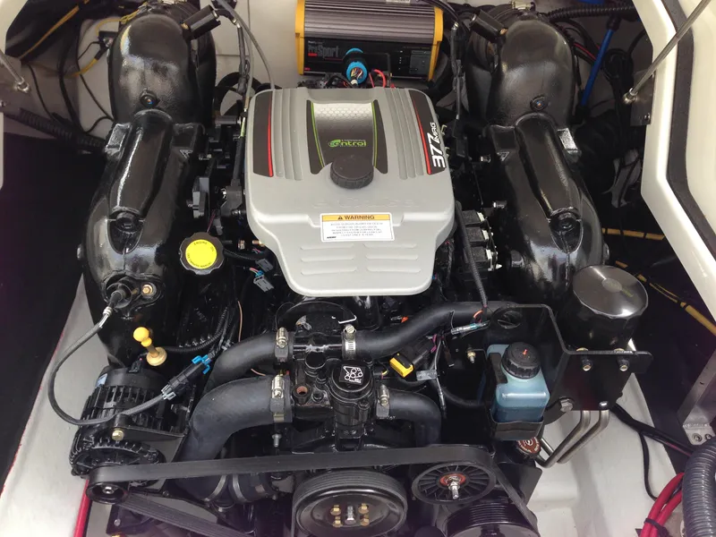 Slide: The Image of Engine compartment of a 2016 Crownline 285 SS boat, clean and well-maintained. - 10