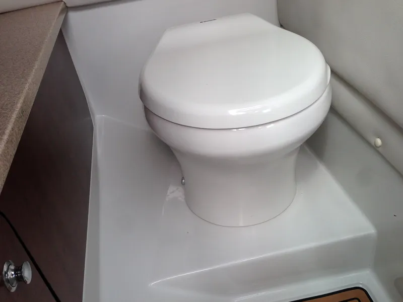 Slide: The Image of Interior toilet of 2016 Crownline 285 SS, modern design. - 21