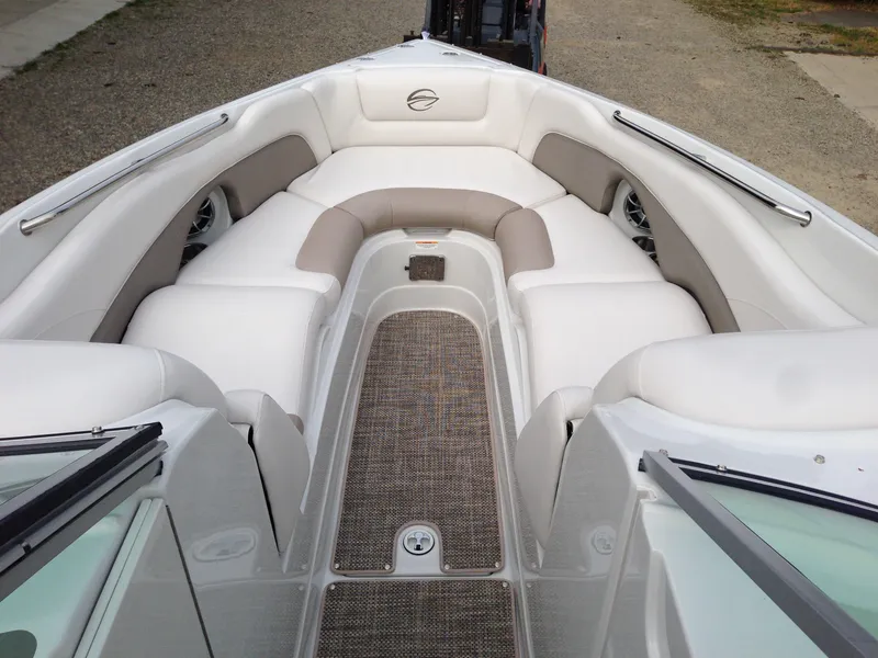 Slide: The Image of Interior view of a 2016 Crownline 285 SS boat with beige upholstery. - 23