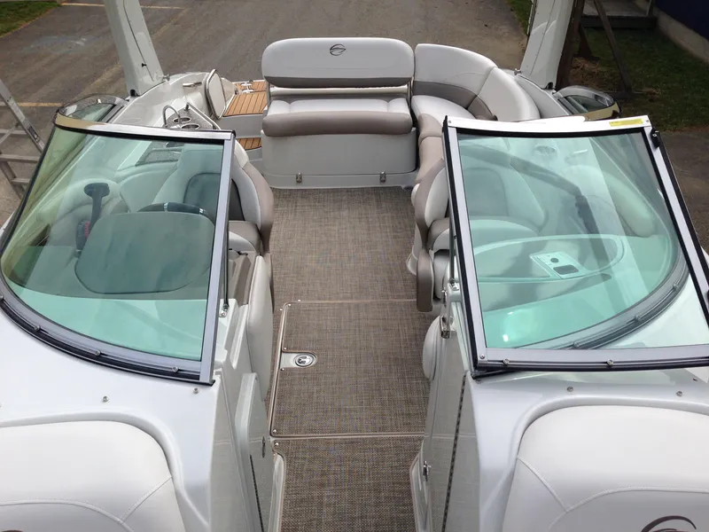 Slide: The Image of Interior of a 2016 Crownline 285 SS boat with seating area. - 25
