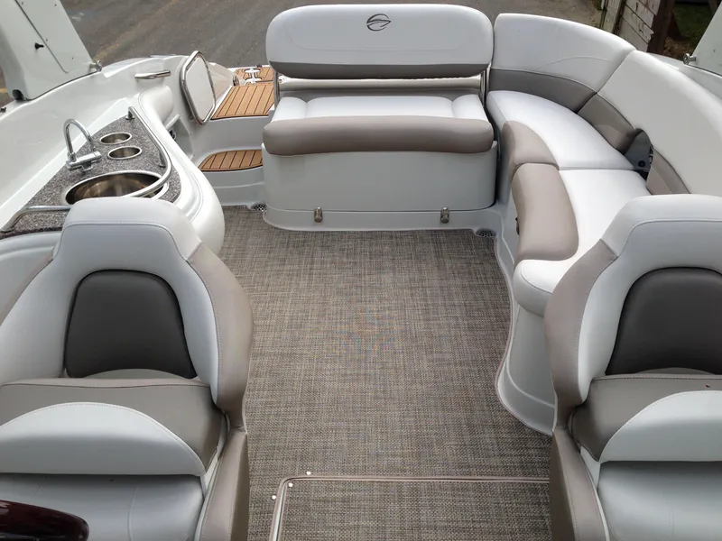 Slide: The Image of Interior of a 2016 Crownline 285 SS boat with seating area. - 26