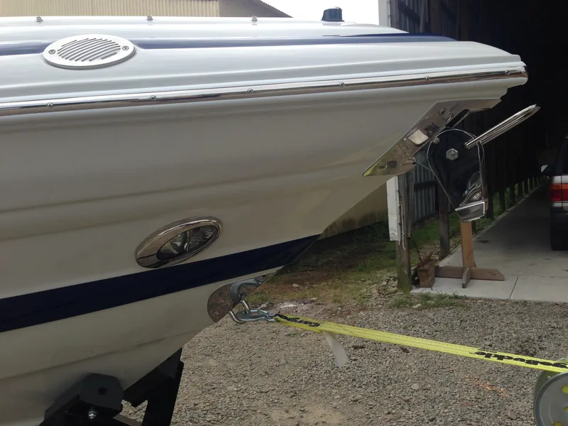 Slide: The Image of 2016 Crownline 285 SS boat, bow view with anchor. - 43