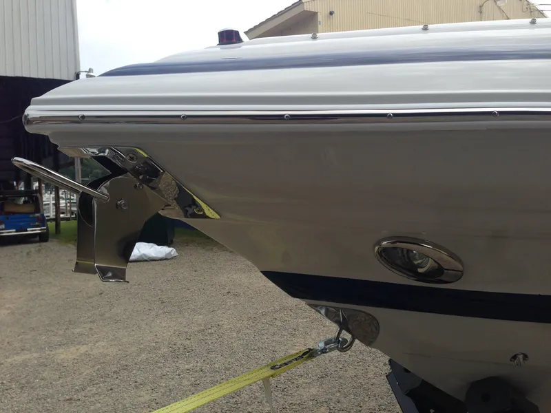Slide: The Image of 2016 Crownline 285 SS boat bow view on a trailer. - 44