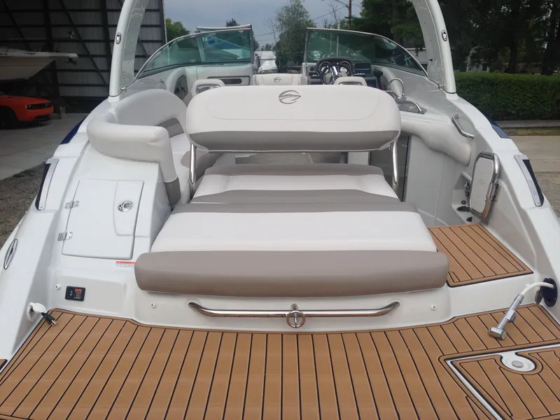 Slide: The Image of 2016 Crownline 285 SS boat with luxurious interior and teak deck. - 48