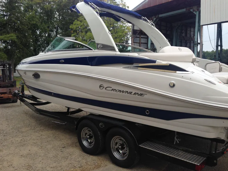Slide: The Image of 2016 Crownline 285 SS boat on trailer, side view. - 5