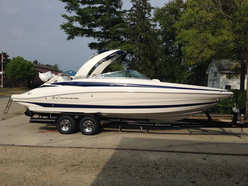 Slide: The Image of 2016 Crownline 285 SS boat on trailer, side view. - 7