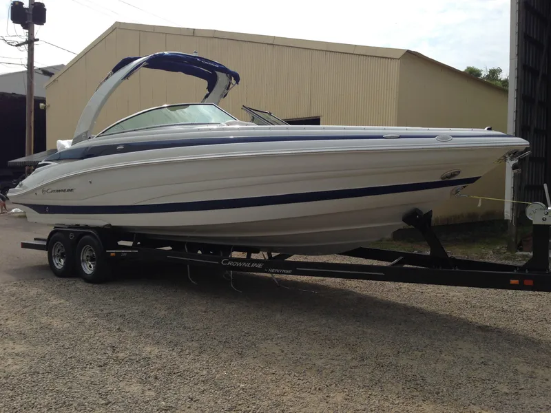 Slide: The Image of 2016 Crownline 285 SS boat on trailer, side view. - 8