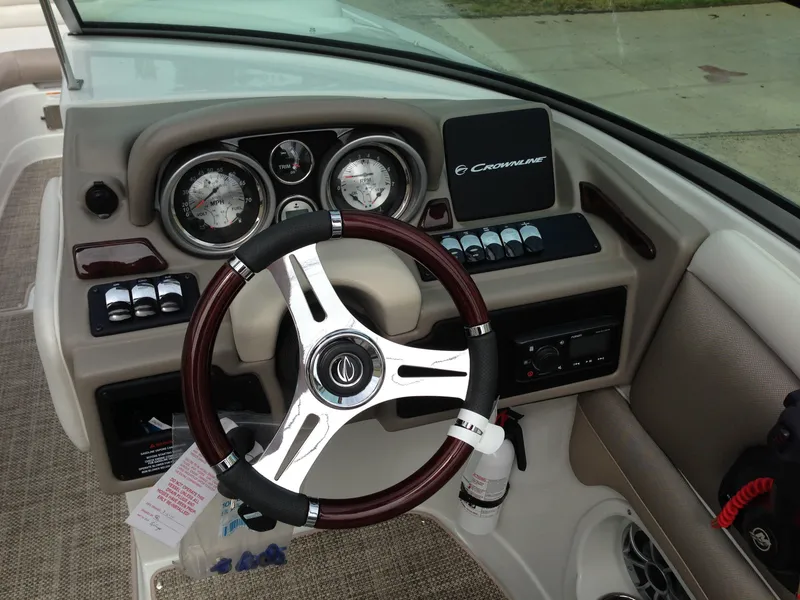 Slide: The Image of Interior view of 2016 Crownline 285 SS boat cockpit. - 9