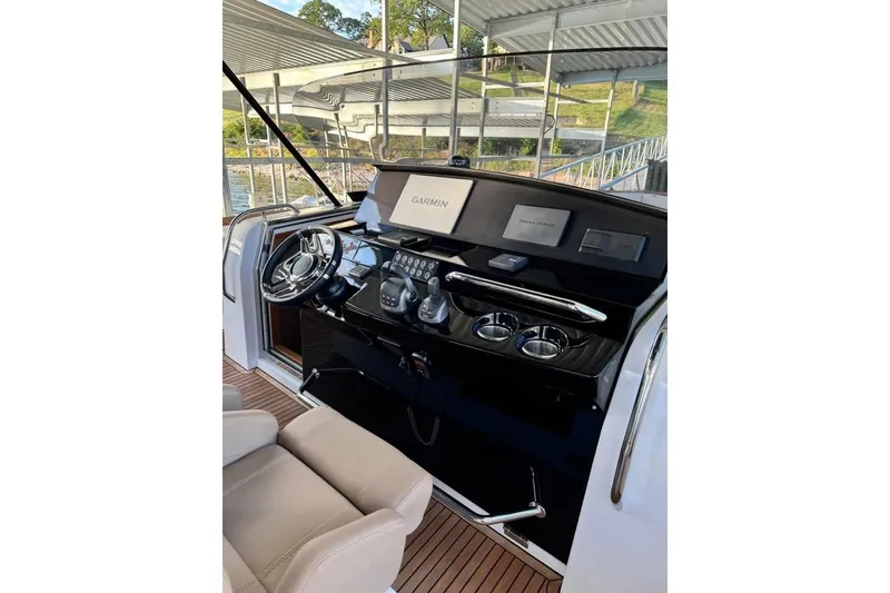Slide: The Image of Helm of 2021 Pardo Yachts P43 with Garmin navigation system and luxurious seating. - 10