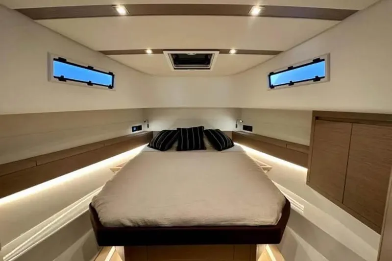 Slide: The Image of Luxurious cabin interior of 2021 Pardo Yachts P43 with modern design and ambient lighting. - 12