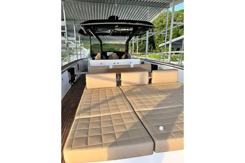 Slide: The Image of 2021 Pardo Yachts P43 with spacious sunbathing area and luxurious seating. - 14