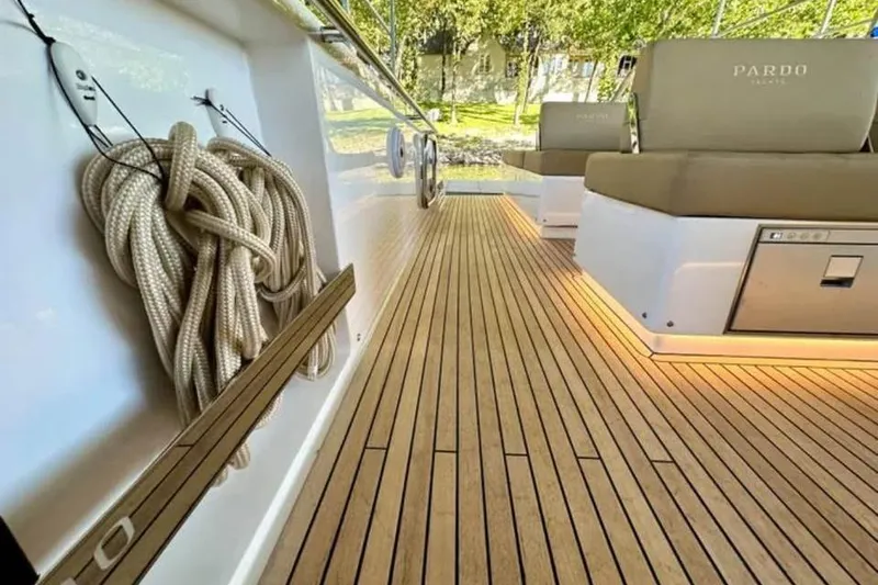 Slide: The Image of Luxurious 2021 Pardo Yachts P43 deck with elegant seating and coiled rope detail. - 3