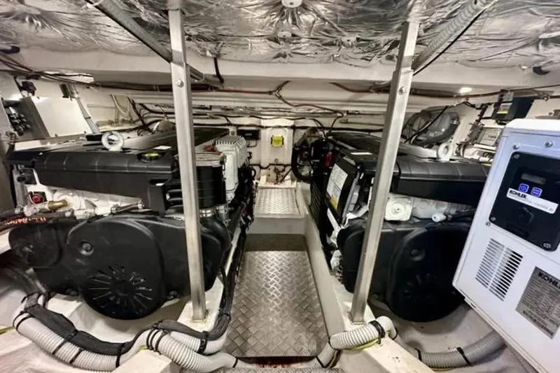 Slide: The Image of Engine room of 2021 Pardo Yachts P43, showcasing dual engines and equipment. - 4