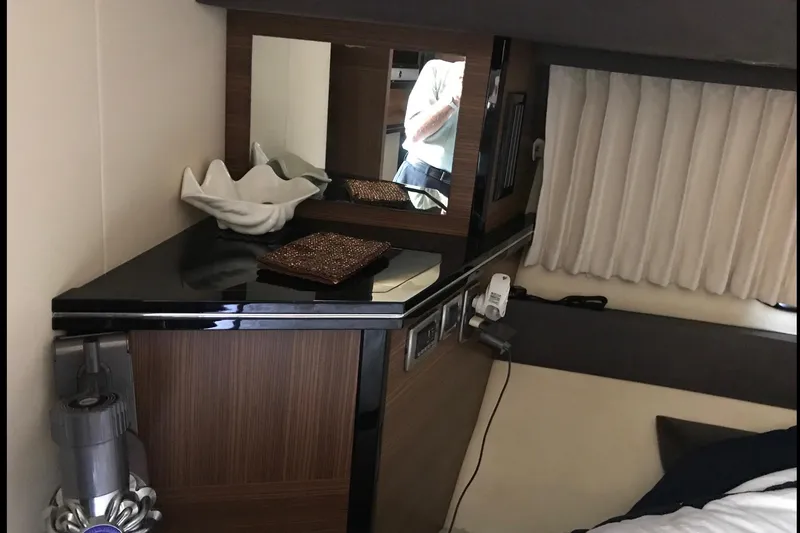 Slide: The Image of Interior of 2014 Marquis 40 SC yacht with elegant wood and modern decor. - 12