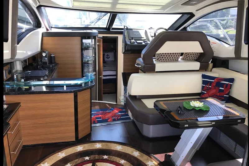 Slide: The Image of Luxurious interior of 2014 Marquis 40 SC yacht with modern design and nautical decor. - 18