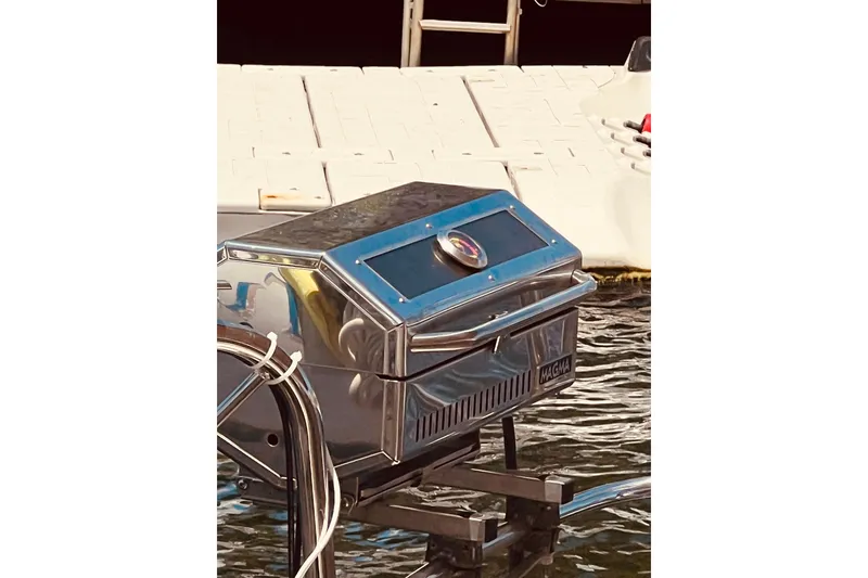 Slide: The Image of Stainless steel grill on Jeanneau Sun Odyssey 519 yacht, docked by the water. - 19