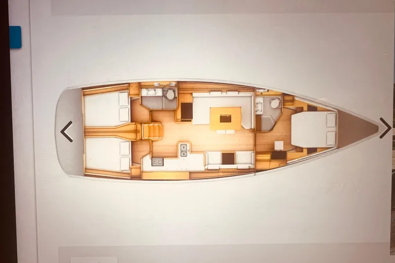 Slide: The Image of Interior layout of a 2016 Jeanneau Sun Odyssey 519 sailboat, featuring cabins and living spaces. - 21