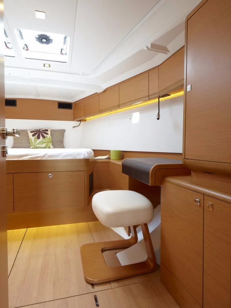 Slide: The Image of Manufacturer Provided Image: Modern interior of 2016 Jeanneau Sun Odyssey 519 yacht with wooden furnishings. - 6