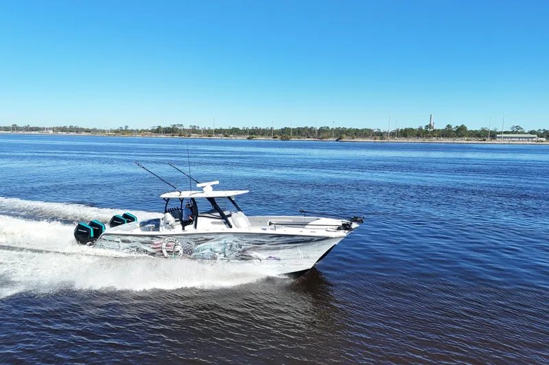 The Image of 2024 Front Runner 37 Catamaran cruising on a sunny day, showcasing sleek design and powerful engines. - 0