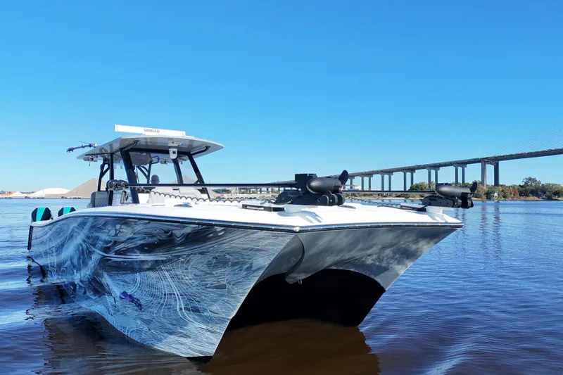 Slide: The Image of 2024 Front Runner 37 Catamaran on water, featuring sleek design and modern technology. - 25