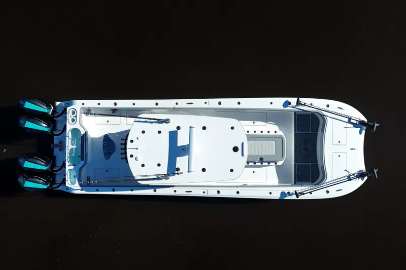 Slide: The Image of Top view of 2024 Front Runner 37 Catamaran with triple outboard engines. - 37