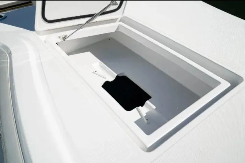 Slide: The Image of Open storage compartment on 2024 Front Runner 37 Catamaran deck. - 78