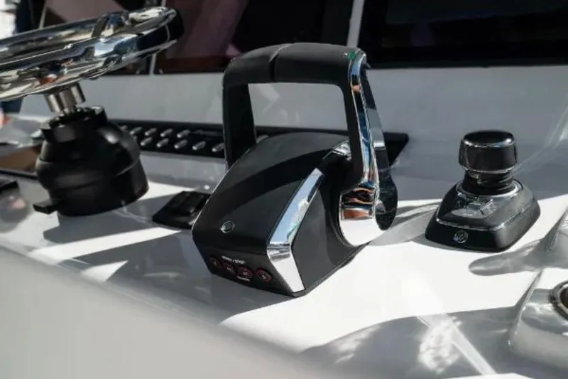 Slide: The Image of Control panel of 2024 Front Runner 37 Catamaran with steering wheel and throttle. - 81