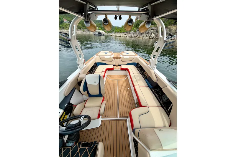 Slide: The Image of 2018 Nautique Super Air Nautique GS24 interior with luxurious seating and modern design. - 21