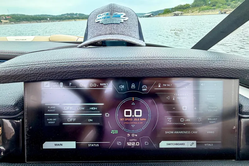 Slide: The Image of Dashboard of a 2018 Nautique Super Air Nautique GS24 boat with digital controls. - 27