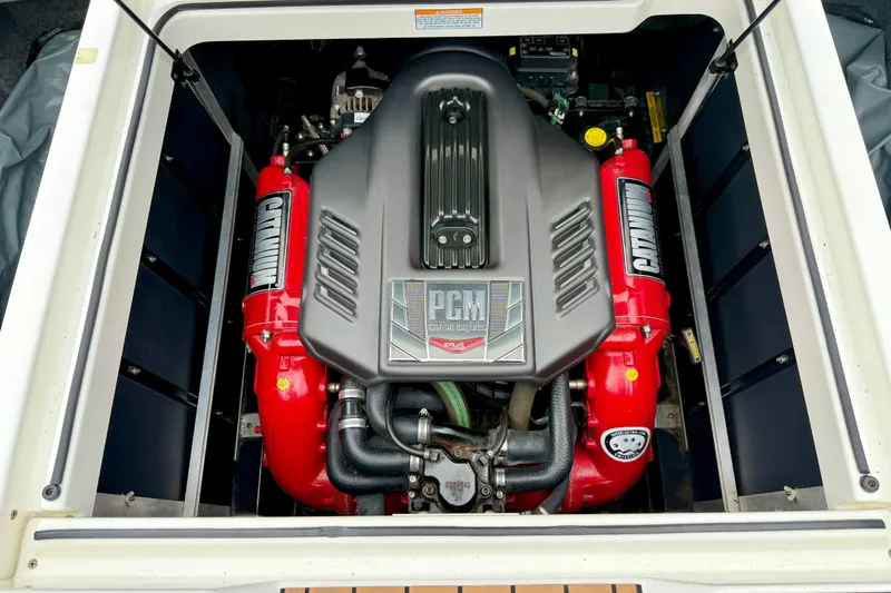 Slide: The Image of Engine of 2018 Nautique Super Air Nautique GS24 boat, featuring PCM components. - 38