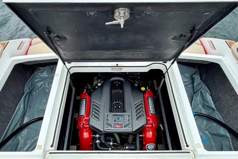 Slide: The Image of 2018 Nautique Super Air Nautique GS24 engine compartment with PCM engine visible. - 39