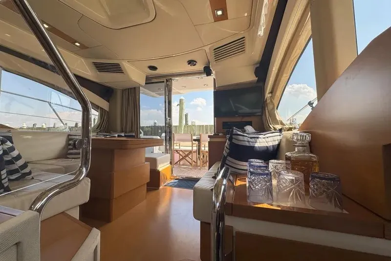 Slide: The Image of Luxurious interior of 2014 Azimut 45 yacht with elegant seating and glassware. - 21