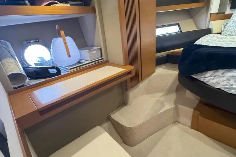 Slide: The Image of Interior of 2014 Azimut 45 yacht with cozy cabin and modern furnishings. - 28