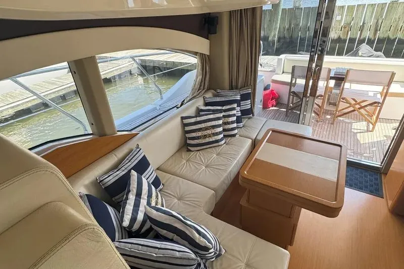 Slide: The Image of Luxurious interior of 2014 Azimut 45 yacht with plush seating and nautical decor. - 38