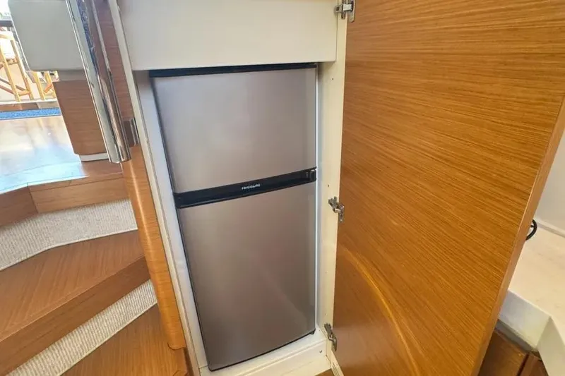 Slide: The Image of Built-in fridge on 2014 Azimut 45 yacht, wooden cabinetry, compact design. - 48