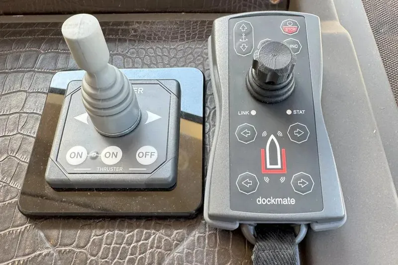 Slide: The Image of Control panel of a 2014 Azimut 45 yacht with joystick and dockmate system. - 50