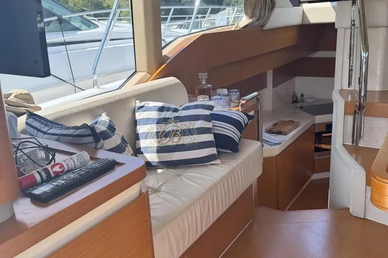 Slide: The Image of Interior of 2014 Azimut 45 yacht with striped cushions and elegant decor. - 55