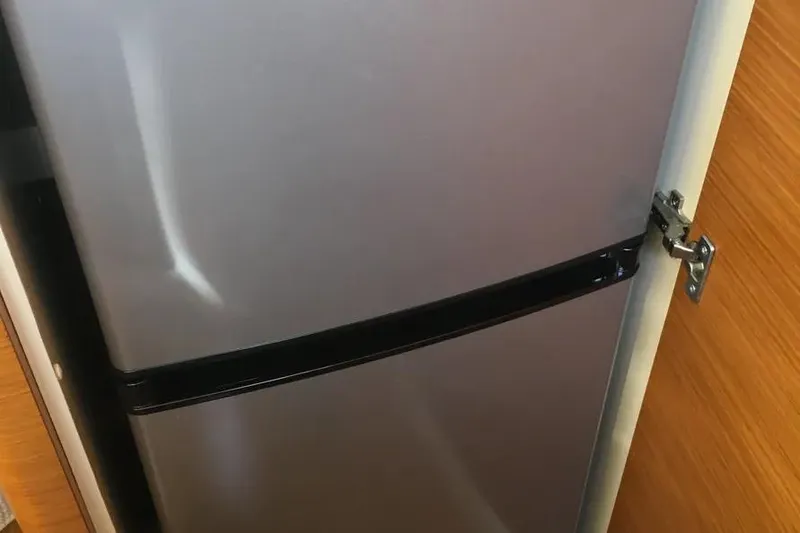 Slide: The Image of Silver refrigerator inside 2014 Azimut 45 yacht kitchen area. - 58