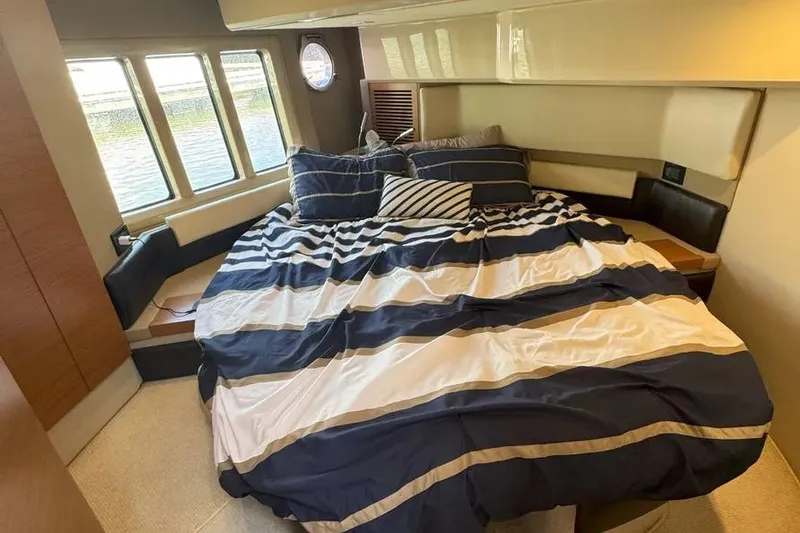 Slide: The Image of Luxurious bedroom interior of 2014 Azimut 45 yacht with striped bedding. - 59