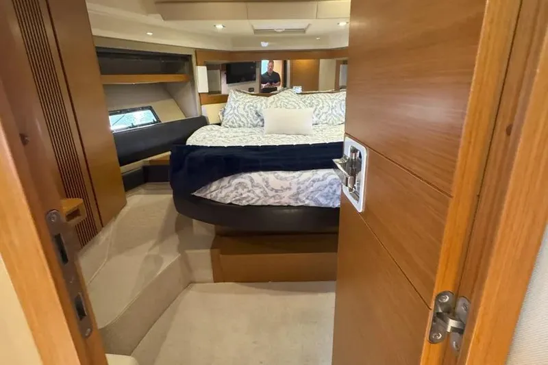 Slide: The Image of Luxurious bedroom interior of 2014 Azimut 45 yacht with elegant bedding and wooden finishes. - 62