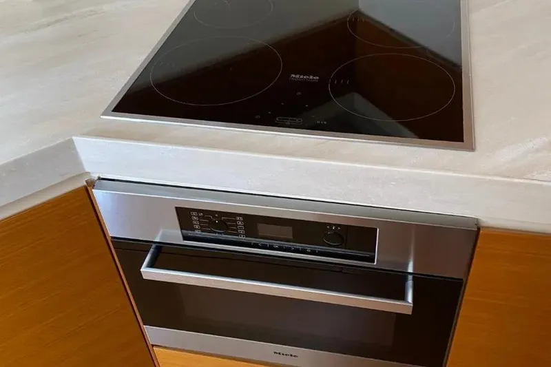 Slide: The Image of Modern kitchen with Miele cooktop and oven on Azimut 45 yacht, 2014 model. - 7