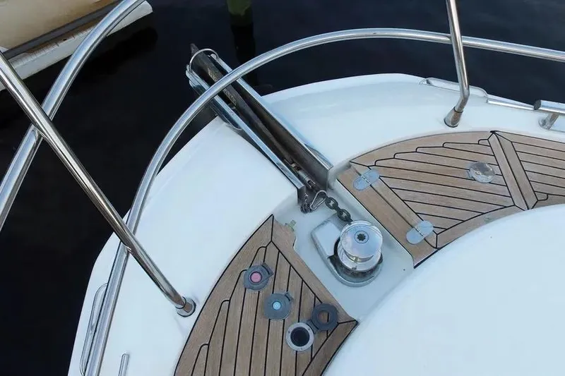 Slide: The Image of Bow deck of 2014 Azimut 45 yacht with teak flooring and stainless steel railings. - 71