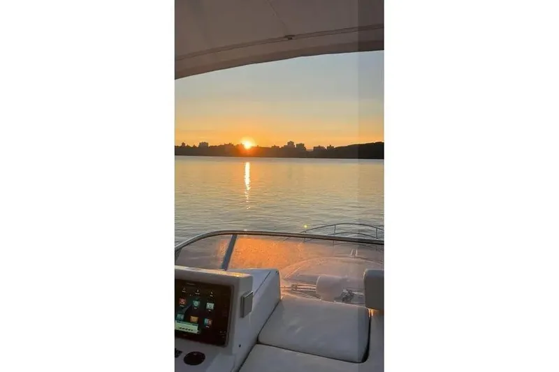 Slide: The Image of Azimut 45 yacht at sunset, serene water view, 2014 model. - 78