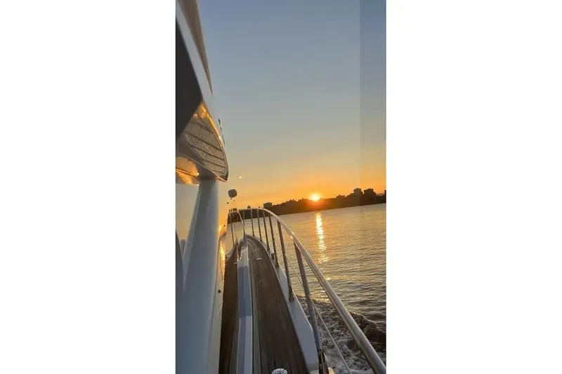 Slide: The Image of Azimut 45 yacht cruising at sunset, 2014 model, serene waterscape. - 79