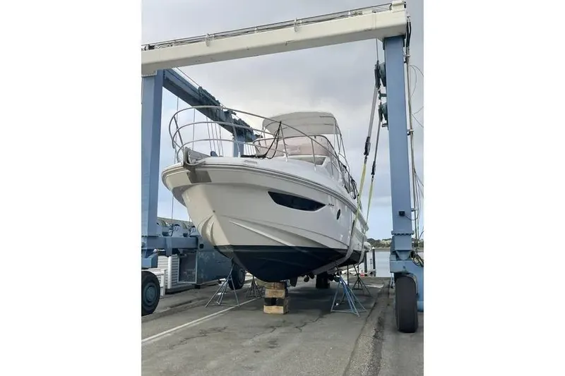 Slide: The Image of 2014 Azimut 45 yacht on a lift, showcasing sleek design and modern features. - 83