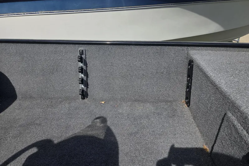 Slide: The Image of Interior view of 2024 TRACKER MARINE CLASSIC XL boat with carpeted flooring. - 5