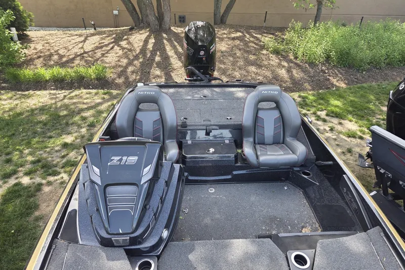 Slide: The Image of 2021 Nitro Z19 Pro boat interior with two seats and storage compartments. - 8