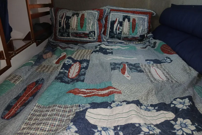 Slide: The Image of Quilted bedspread with feather design in Endeavour Trawlercat 36, 1999 model cabin. - 21