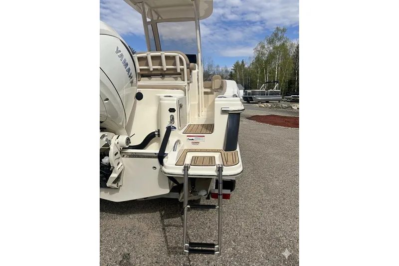 Slide: The Image of 2025 Scout 215 XSF boat rear view with Yamaha engine and swim ladder. - 3