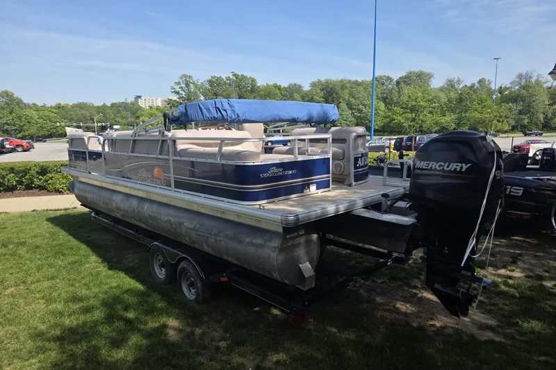 Slide: The Image of 2014 Sun Tracker Party Barge 24 pontoon boat with Mercury outboard motor on trailer. - 3